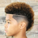 Best-Black-Mens-Haircuts-Burst-Fade-Mohawk