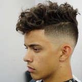 High-Skin-Fade-Messy-Medium-Length-Curly-Hair