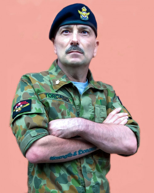 John Torcasio:  Wearing Disruptive Pattern Camouflage Uniform (DPCU)