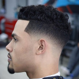 Low-Skin-Fade-with-Curly-Hair