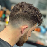 Low-Taper-Fade-with-Curly-Fringe-and-Beard