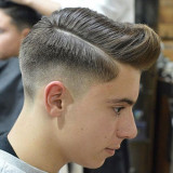 Medium-Skin-Fade-with-Hard-Part-Comb-Over