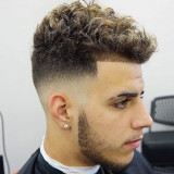 Mid-Skin-Fade-with-Line-Up-and-Spiky-Curls