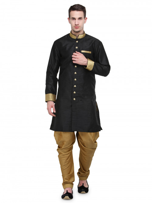 Black and gold Pathani Sherwani from RG Designers made from Zari work. http://bit.ly/2ogZL6p