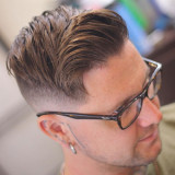 Side-Swept-Hair-with-Mid-Skin-Fade